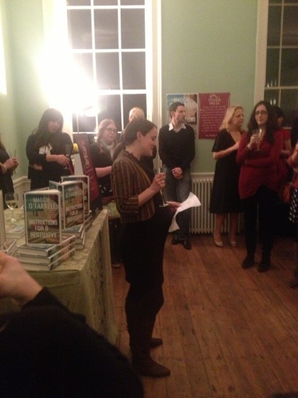 Mary-Anne Harrington, Tinder Press editor, congratulates Maggie